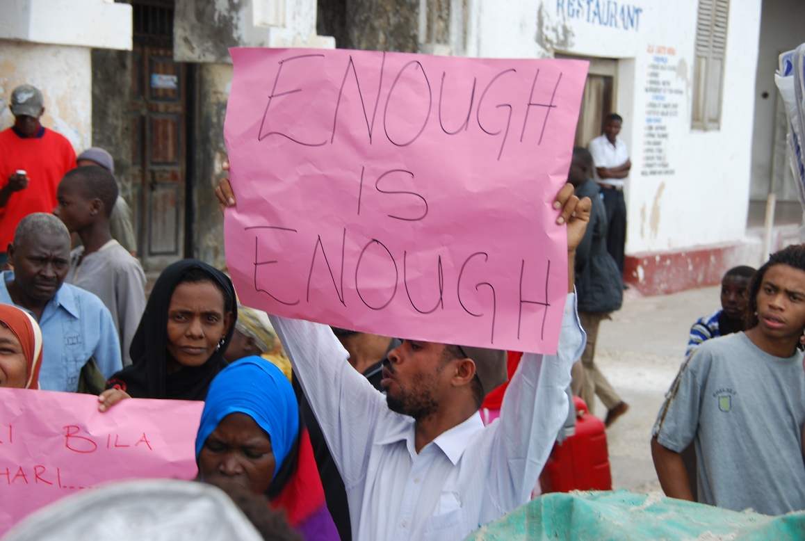 Save Lamu volunteer, Is-haq Khatib, volunteering at a demonstration